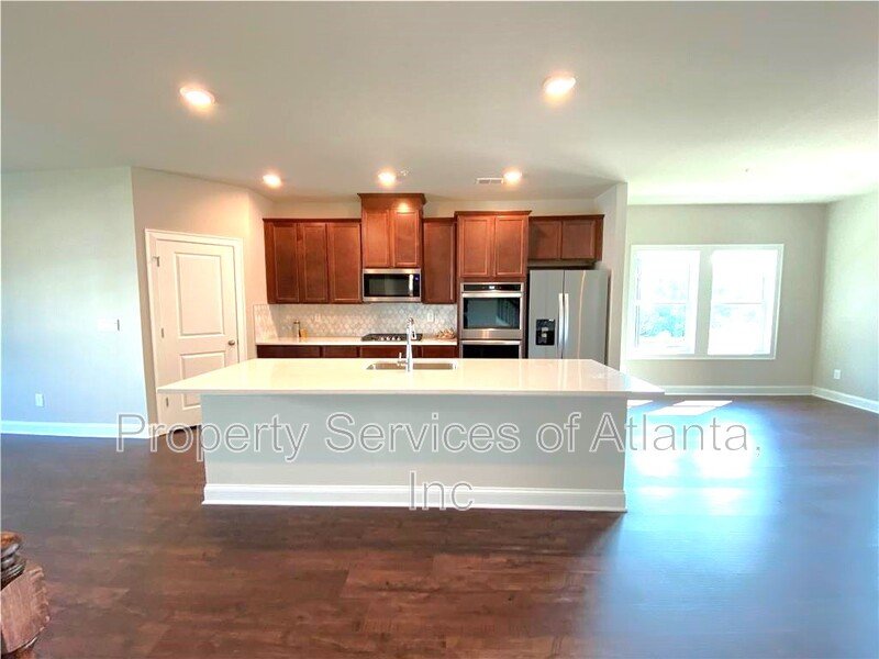 Woodstock - 4BR/3.5BA -TOWNHOUSE-GREAT SCHOOLS-INCLUDES LANDSCAPING. property image