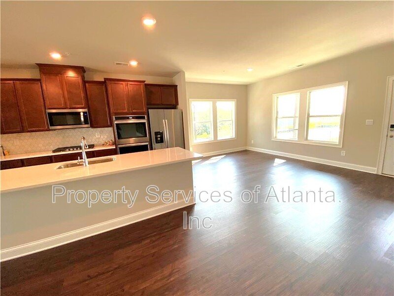 Woodstock - 4BR/3.5BA -TOWNHOUSE-GREAT SCHOOLS-INCLUDES LANDSCAPING. property image